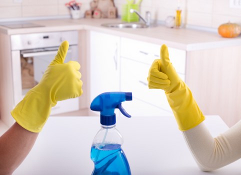 Cleaner handling carpet cleaning tools with care